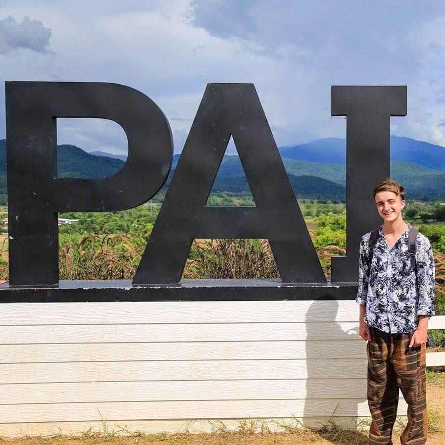 Image may contain: Female, People, Rock, Man, Alphabet, Face, Cross, Symbol, Text, Rural, Building, Countryside, Shelter, Nature, Plant, Grass, Outdoors, Denim, Jeans, Human, Person, Pants, Apparel, Clothing