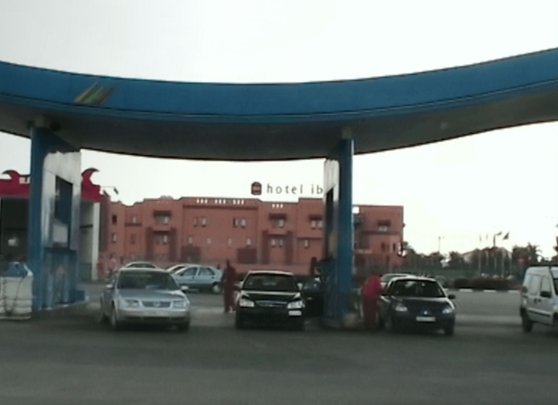 Image may contain: Madeleine McCann sightings, Madeleine McCann, the disappearance of Madeleine McCann, Netflix, Morocco, Petrol station, Gate, Person, Human, Automobile, Vehicle, Car, Transportation