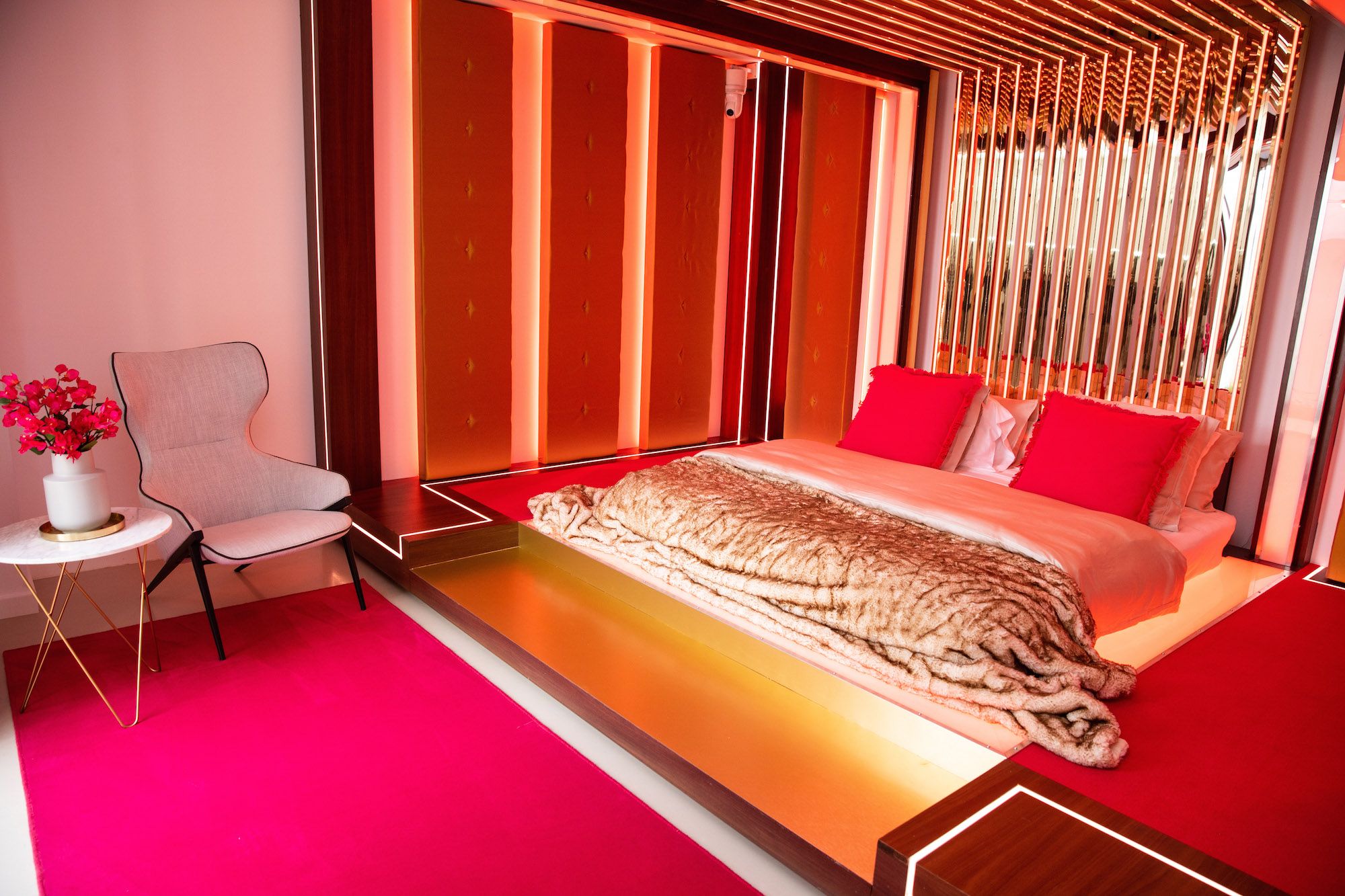 Image may contain: Love Island villa, 2019, villa, Love Island, location, Majorca, Hotel, Rug, Wood, Bed, Bedroom, Lighting, Room, Housing, Building, Chair, Interior Design, Indoors, Furniture