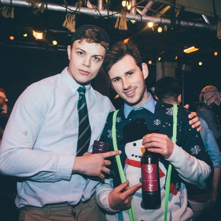 Image may contain: Night Club, Liquor, Party, Club, Pub, Bar Counter, Beer, Alcohol, Beverage, Drink, Accessory, Tie, Accessories, Human, Person