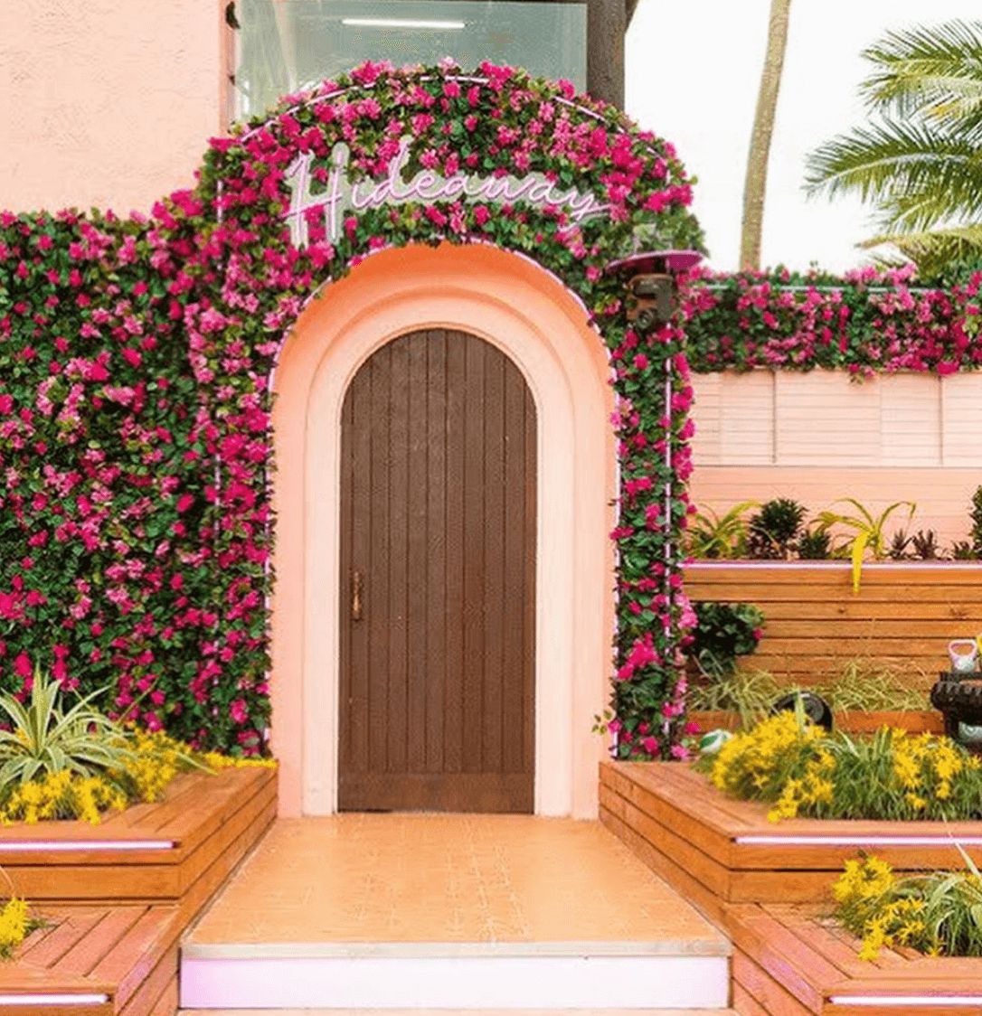 Image may contain: Love Island USA villa, Love Island USA, villa, Love Island, CBS, Fiji, Hideaway, Backyard, Door, Blossom, Flower, Arbour, Plant, Garden, Yard, Nature, Outdoors