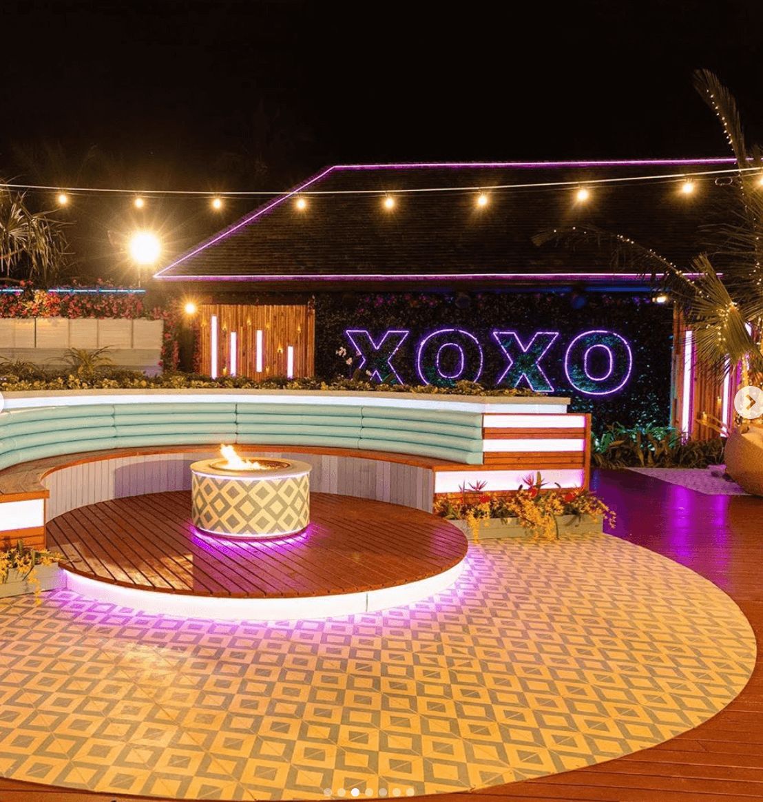 Image may contain: Love Island USA villa, Love Island USA, villa, Fiji, fire pit, Love Island, CBS Club, Crowd, Lighting