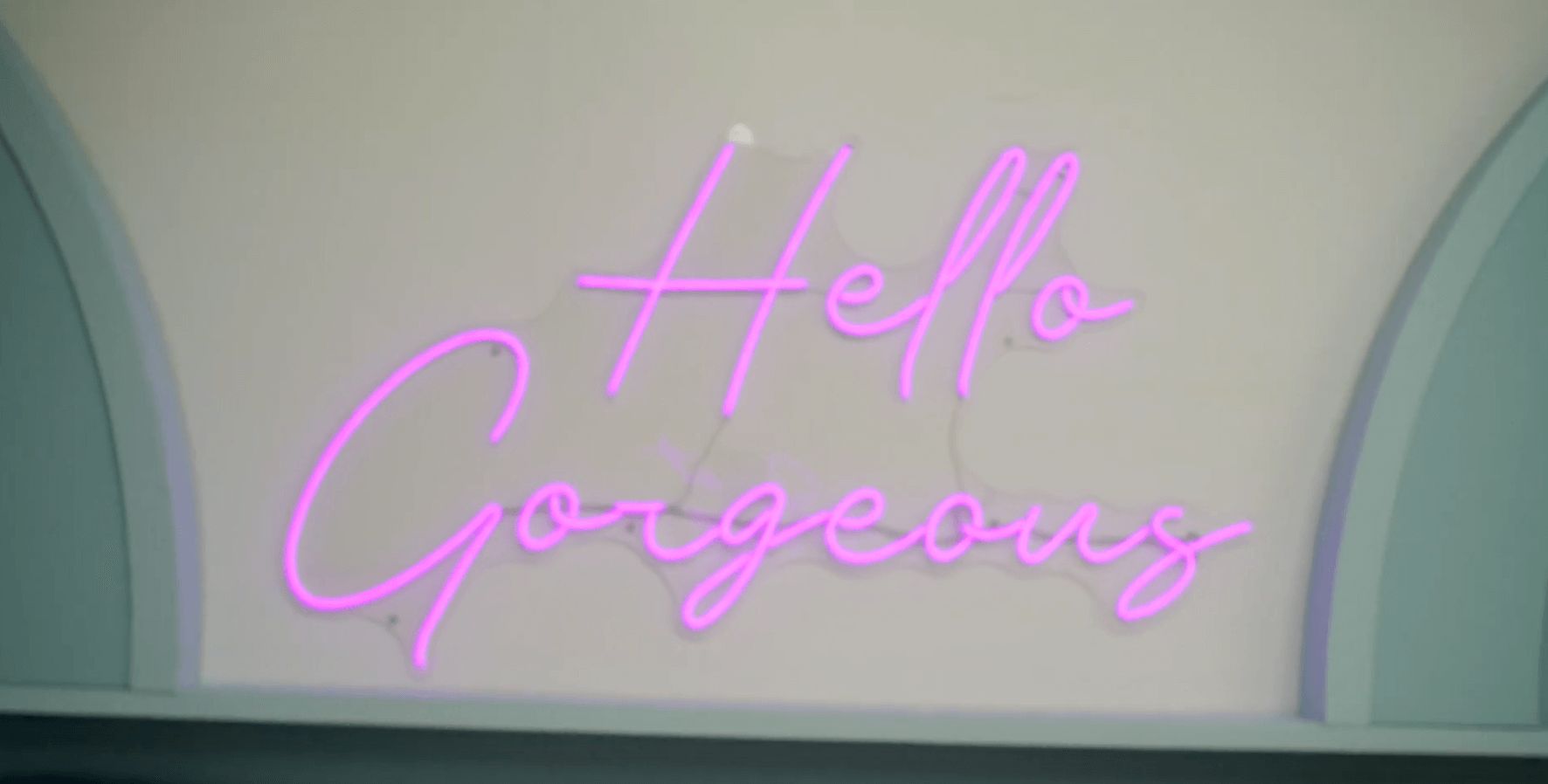 Image may contain: Love Island USA villa, Love Island USA, villa, Love Island, CBS, Fiji, neon, slogan, sign, Electronics, Screen, Handwriting, Alphabet, White Board, Text