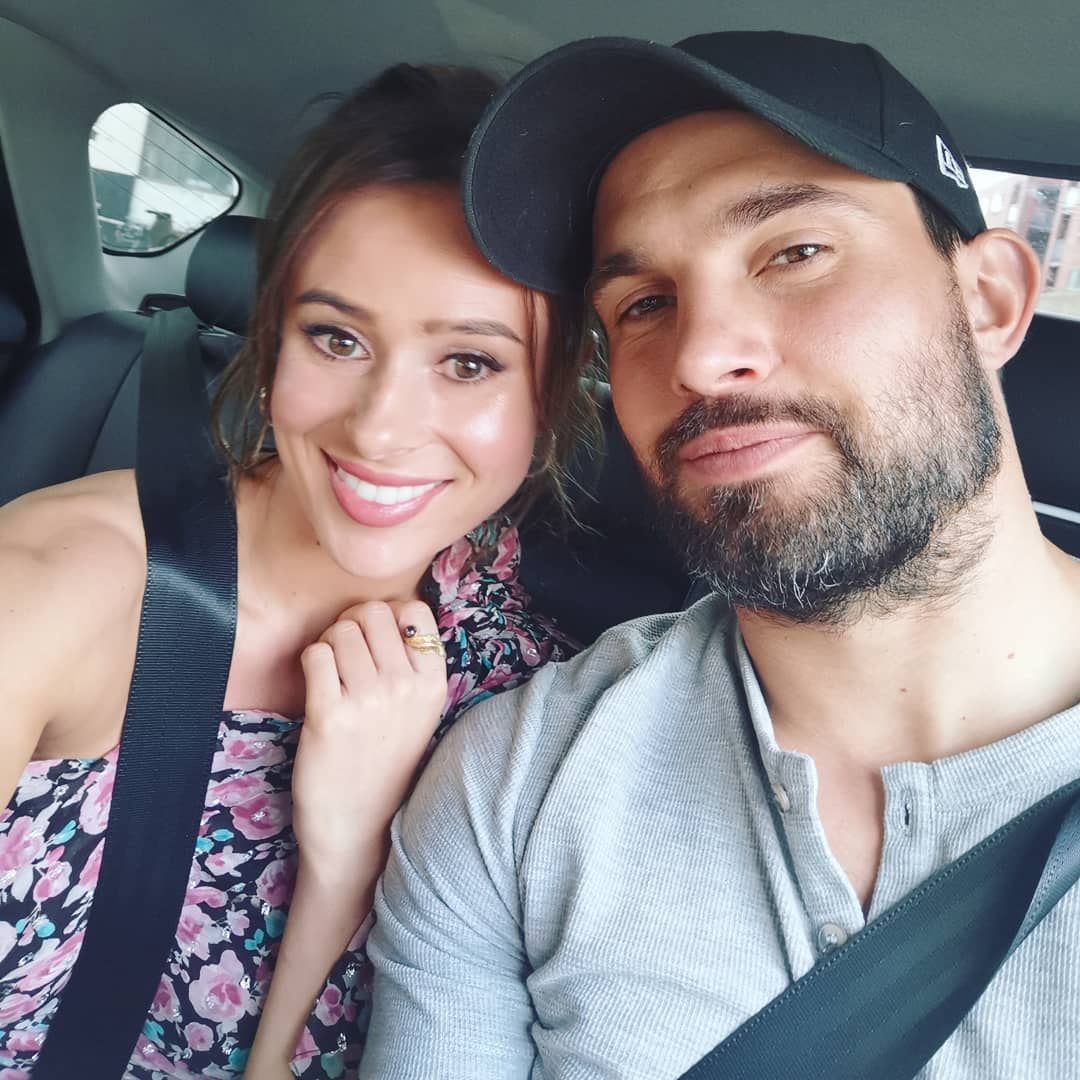Image may contain: Love Island cast GCSE results, GCSE, results day, 2019, exams, Camilla Thurlow, Jamie Jewitt, Love Island, cast, Islanders, GCSE results day 2019, Hat, Apparel, Clothing, Cap, Baseball Cap, Selfie, Portrait, Photography, Photo, Seat Belt, Cushion, Accessory, Accessories, Belt, Face, Person, Human