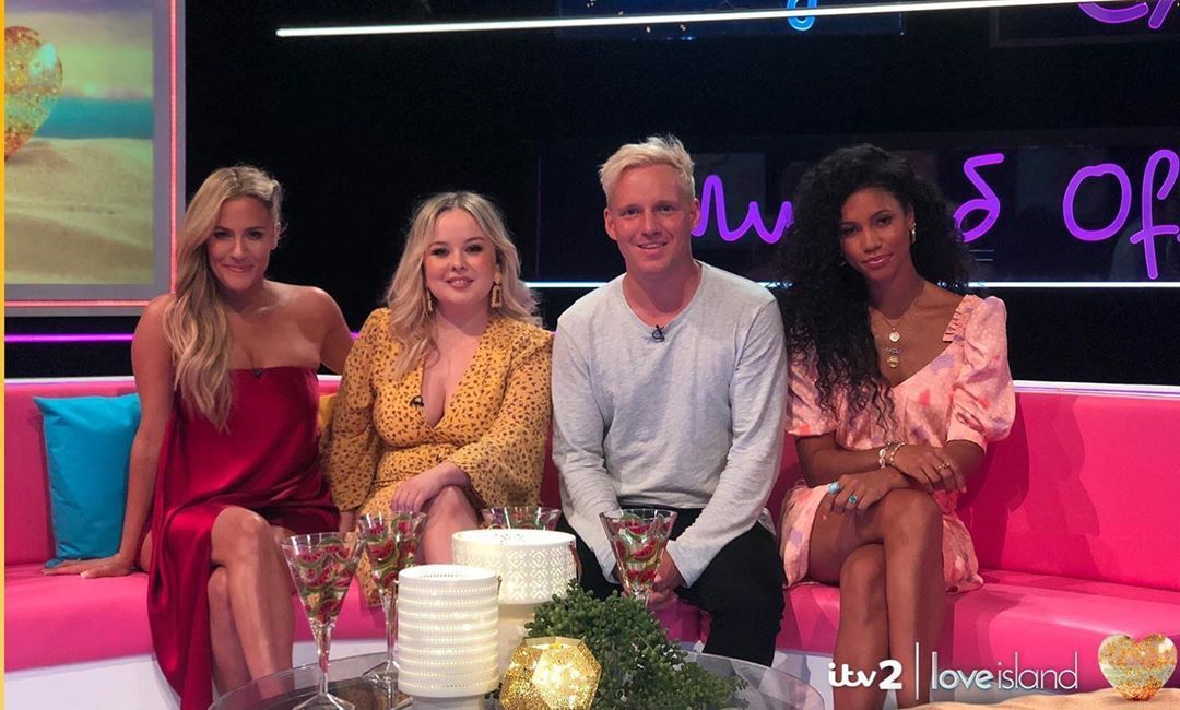 Image may contain: Derry Girls cast, Derry Girls, Nicole Coughlan, Clare, age, how old, Instagram, from, Netflix, Channel 4, season 2, season 3, Love Island, Aftersun, Brexit, Indoors, Interior Design, People, Couch, Furniture, Flower Bouquet, Flower Arrangement, Flower, Blossom, Plant, Person, Human
