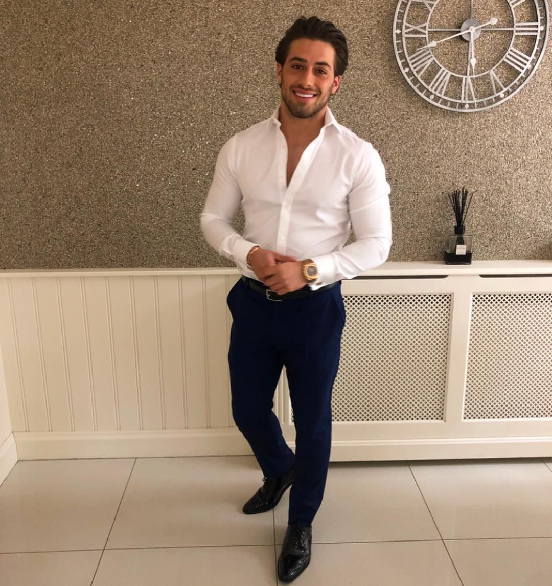Image may contain: Love Island cast GCSE results, GCSE, results day, 2019, exams, Kem Cetinay, Love Island, cast, Islanders, GCSE results day 2019, Man, Shirt, Pants, Person, Human, Clothing, Footwear, Shoe, Apparel