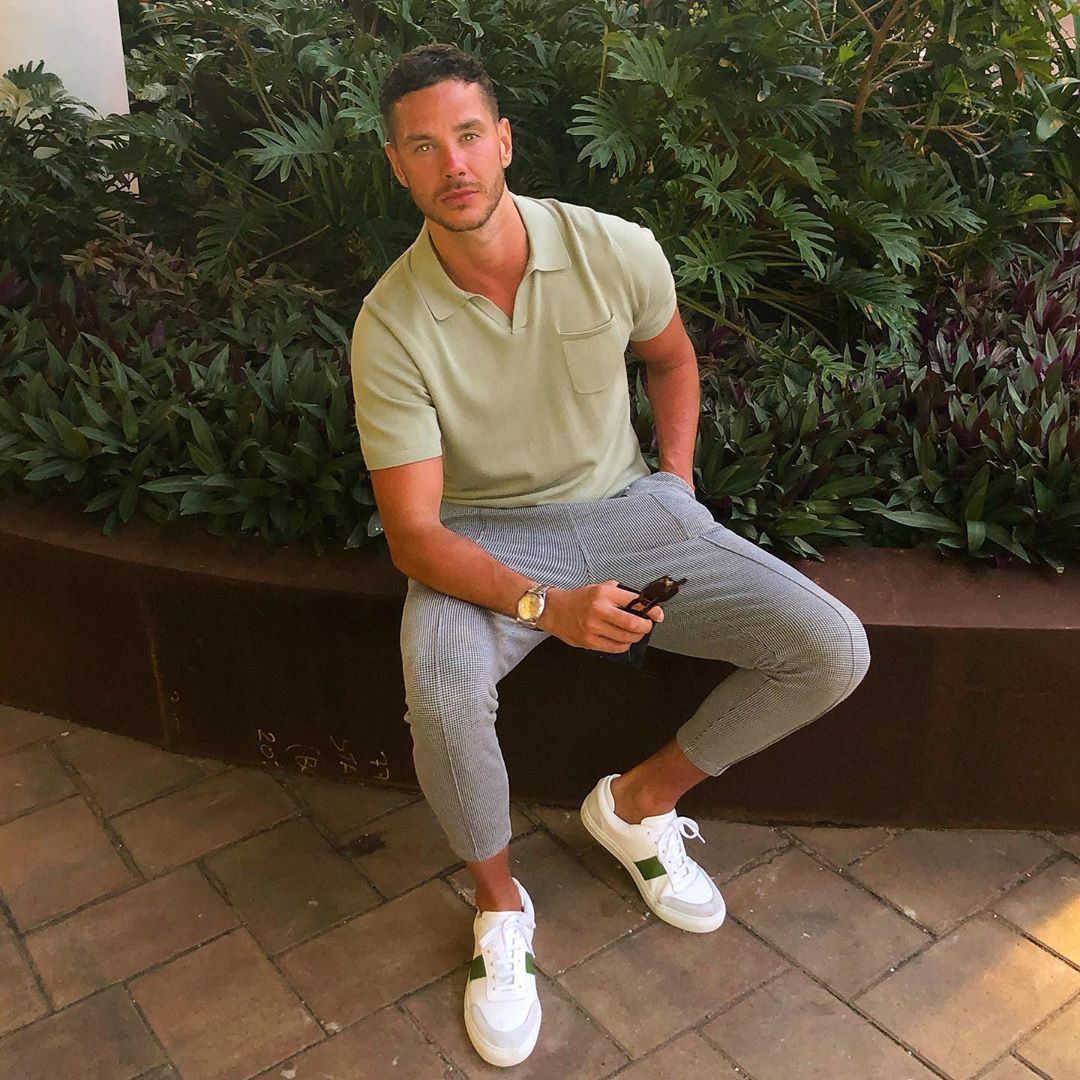 Image may contain: Love Island cast GCSE results, GCSE, results day, 2019, exams, Scott Thomas, Love Island, cast, Islanders, GCSE results day 2019, Sleeve, Running Shoe, Flagstone, Human, Person, Footwear, Shoe, Clothing, Apparel