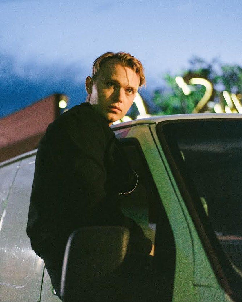 Image may contain: The I-Land cast, The I-Land, island, Netflix, Gilles Geary, Mason, stars, films, tv, series, Instagram, age, job, Man, Tire, Person, Human