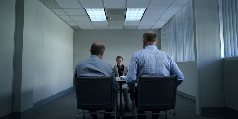 Image may contain: Marie Adler, Netflix, Unbelievable, real life, story, true crime, now, what happened, lie, truth, Marc O'Leary, police, investigation, case, updates, latest, news, Skylight, Meeting Room, Conference Room, Window, Architecture, Building, Indoors, Room, Human, Person, Chair, Furniture