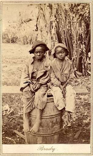 An undated rare photo provided by Keya Morgan, found in a North Carolina attic, depicts two slave children, art historians say. In April, the photo was found at a moving sale in Charlotte, accompanied by a document detailing the sale of John for $1,150 in 1854. The picture was purchased for $30,000 by collector Keya Morgan. (AP Photo/Courtesy of Keya Morgan, LincolnImages.com)