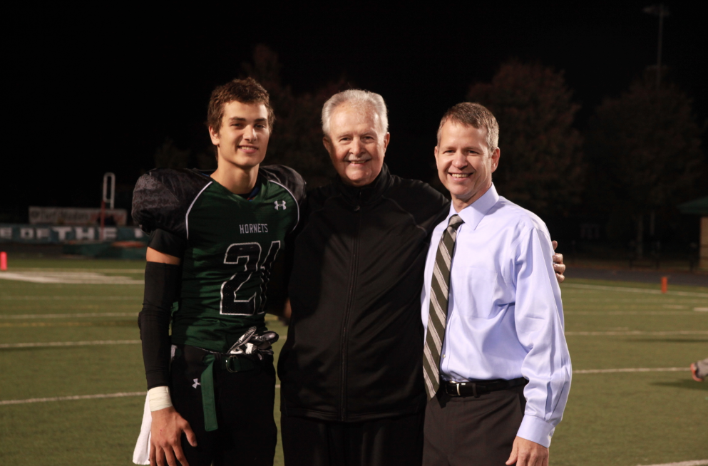 Three generations of football players my grandpap, my dad, and my brother.