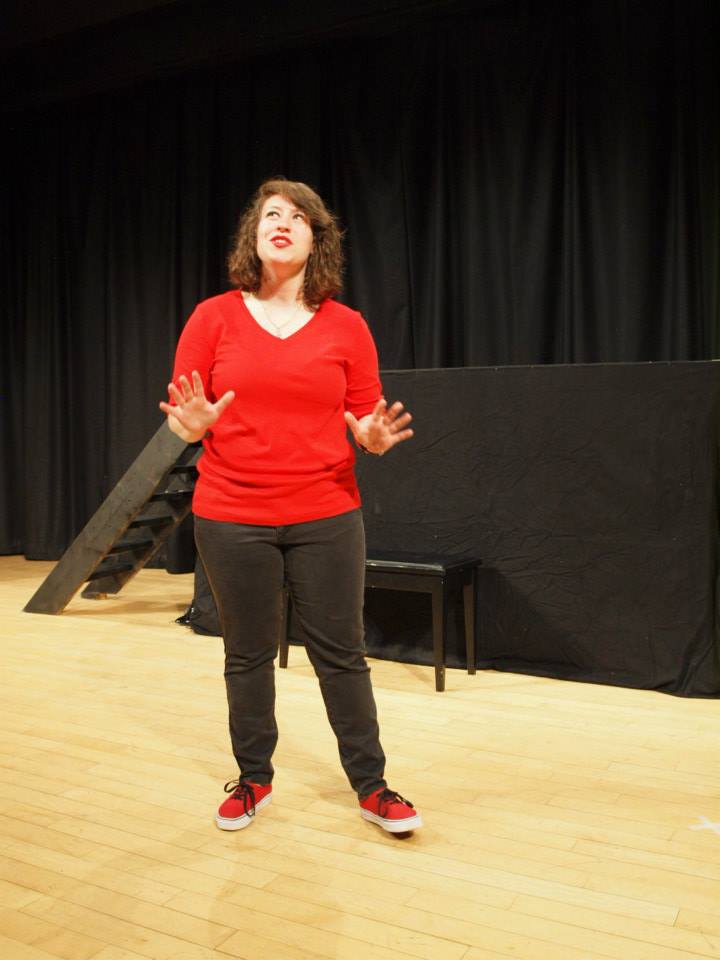 Ali performing her monologue