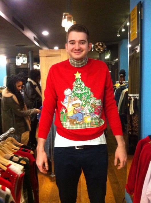 Tab legend Tom Jenkin struggles to find an appropriate piece of festive knitwear