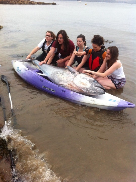 The Brookes graduates pose with their catch of the day.