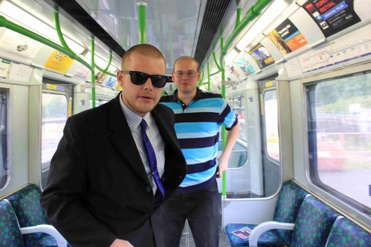Joshua Bonehill frowning on the District Line