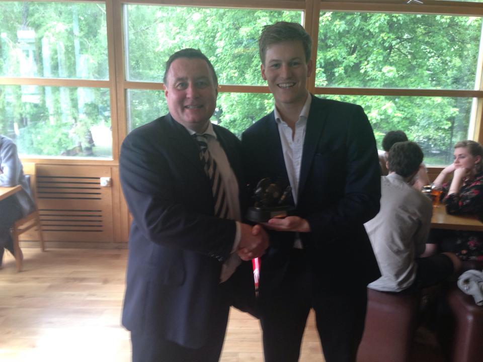 The man himself receives an end-of-year award from DUAFC's Club Captain