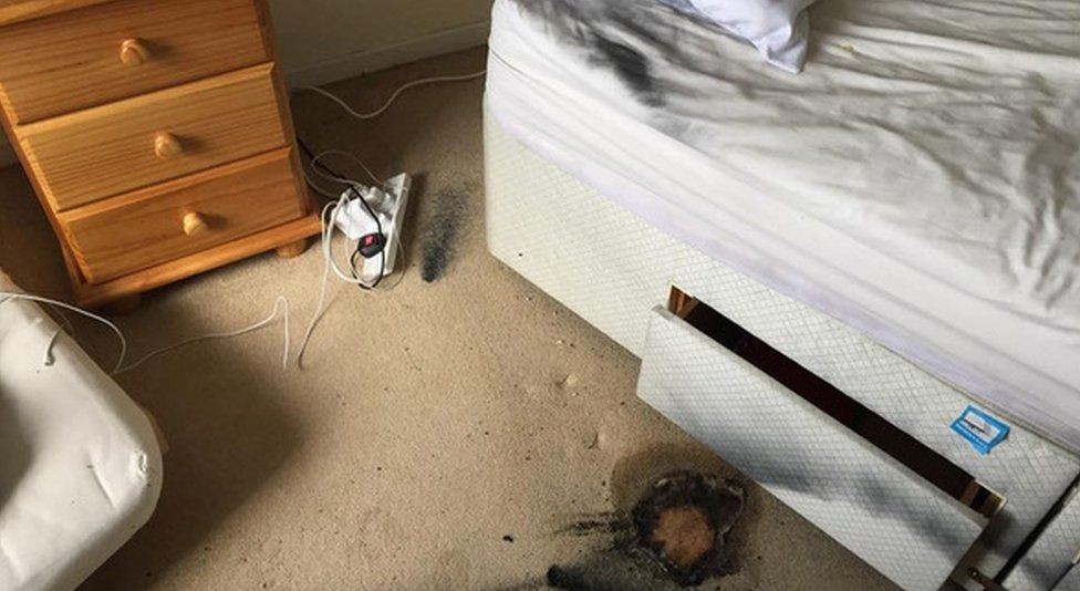 _84513603_burnedbedroom