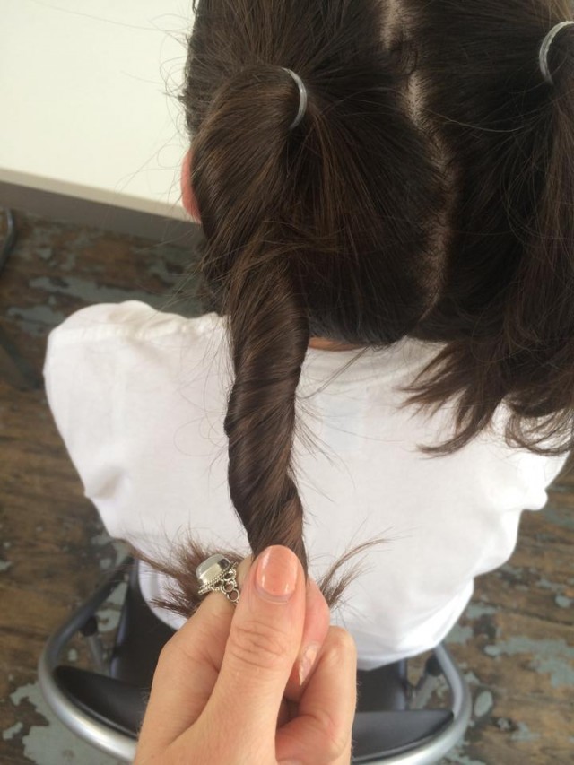 Twist each pony into a bun and fasten with a band