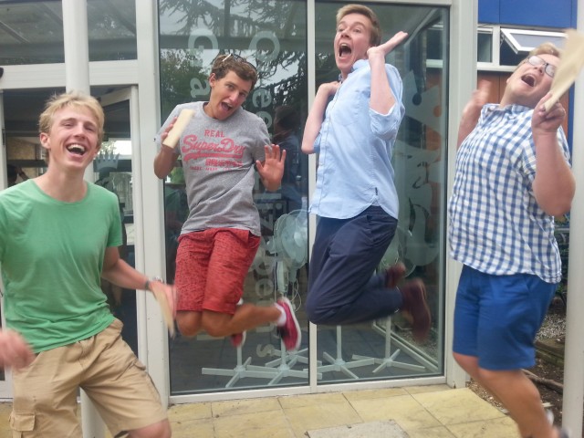 Boys at Queen Elizabeth's Grammar School pupils Seb Dickson, Joe Wareham, James Felton leap with joy as they recieve their A Level results, August 14 2014. The photo was taken in parody to the annual girls leap with A level results that appears in many newspapers.