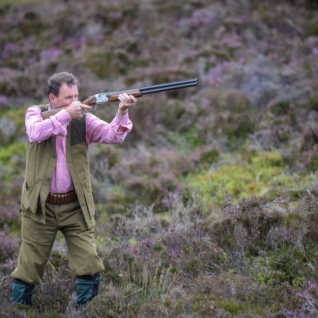 A member of a shooting party is pictured on a shoot near Glenclova, Scotland on August 12 2015. Known as the Glorious Twelfth, today marks the beginning of the Grouse hunting season. A shooting party took to the hills surrounding Glenclova in what's thought to be a bad season for Grouse hunting.
