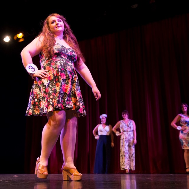 Competitors take part in the Miss British Beauty Curve 2015 pageant at the Epsom Playhouse in Epsom, Surrey. These buxom beauties prove that big really is beautiful as they strut their stuff at the Miss British Beauty Curve 2015 competition. See swns story SWCURVE. The pageant for plus-size women saw 27 contestants - ranging from a size 14 to a 26 - flaunt their figures onstage on Saturday evening at Epsom Playhouse, Surrey. After battling fashion-wear, swimsuit and evening gown rounds, it was Miss Preston Curve Rebecca Argent, 19, who walked away with the under-30 ÃMissà title last night, beating the 18 other women in this category. The gorgeous teen, whoÃs a size 18 and works in retail, said: ÃThis is the best day of my life à I canÃt stop crying! ÃIÃve always felt discriminated against and nervous because of being a bigger girl. I used to be the shy quiet girl who was bullied because sheÃs fat. ÃDoing this has changed me completely ÃIÃd never have stood up on a stage in swimwear or spoken in front of a crowd before entering. ÃThe best part about winning is being a positive role models to girls who were bullied in school like I was Ãto show them they donÃt have to be a size zero to be beautiful. They can be curvacious and still come away with a big sparkly crown. The winner of the ÃMsà title à for women aged 30 plus à was 31 year old Ms Surrey Curve Katherine Henry, who beat eight contestants to win first place.