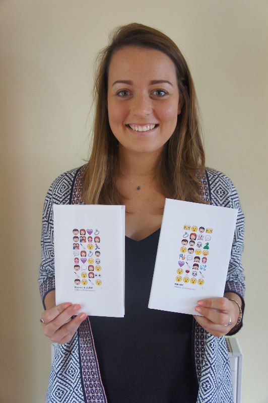 Jamie with her Emoji plays as book covers