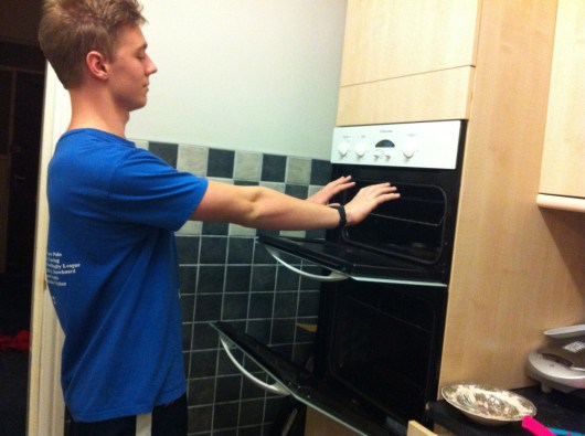 Switching on the oven to warm up your hands is probably not advice the NUS would give