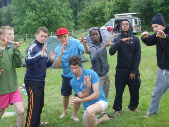 Arun's rocking a black hoodie, second to the right