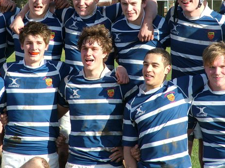 Teddy (centre) in his school rugby days