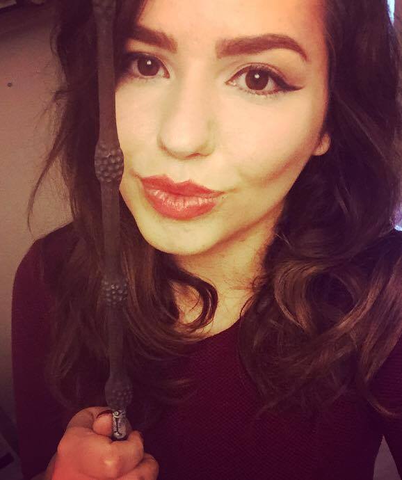 Chloe with her precious Elder Wand