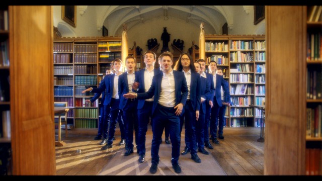 Out of the Blue, a group of posh toffs from Oxford University have released the most cringeworthy Christmas single of all time - an all-male choir rendition of 'Santa Baby.' See SWNS story SWCRINGE. Out of the Blue, a 12-piece a cappella group, shot a cheesy video for the festive hit which captured them in action all over famous Oxford landmarks - serenading each other. The lyrical lads donned blue suits and Santa hats for the quirky rendition of Eartha Kitts much-loved classic and combined tight harmonies with outrageous choreography. Last year, they racked up over SIX MILLION views with a cover of ShakiraÃs ÃHips donÃt lieà which made a whopping Ã10,000 for a childrenÃs hospice. Helen and Douglas House, in Oxford, was the first hospice for children in the world, and running purely on donations, has benefitted hugely from the groupÃs fundraising efforts.
