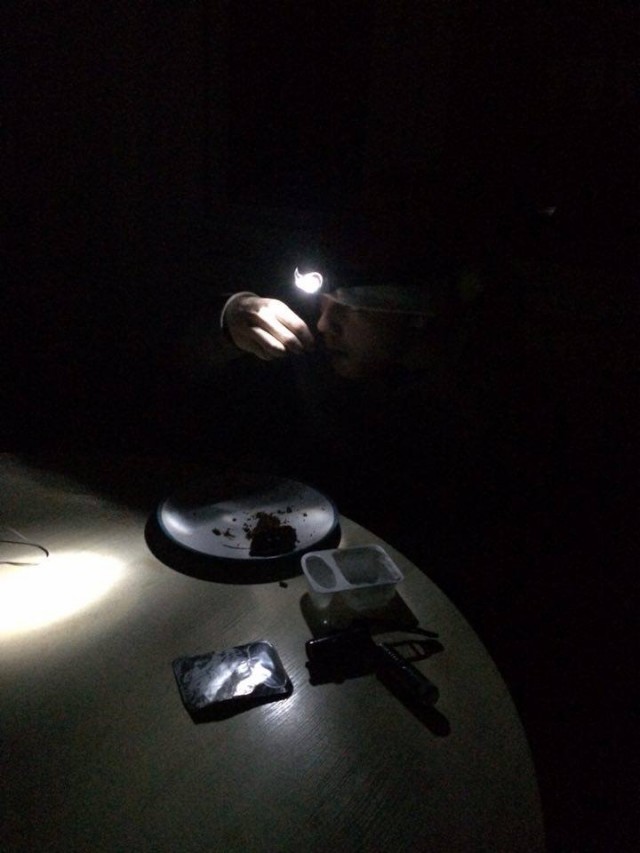 Helena and her flatmate trying to eat in the dark