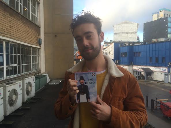 A hipster with his hipster book
