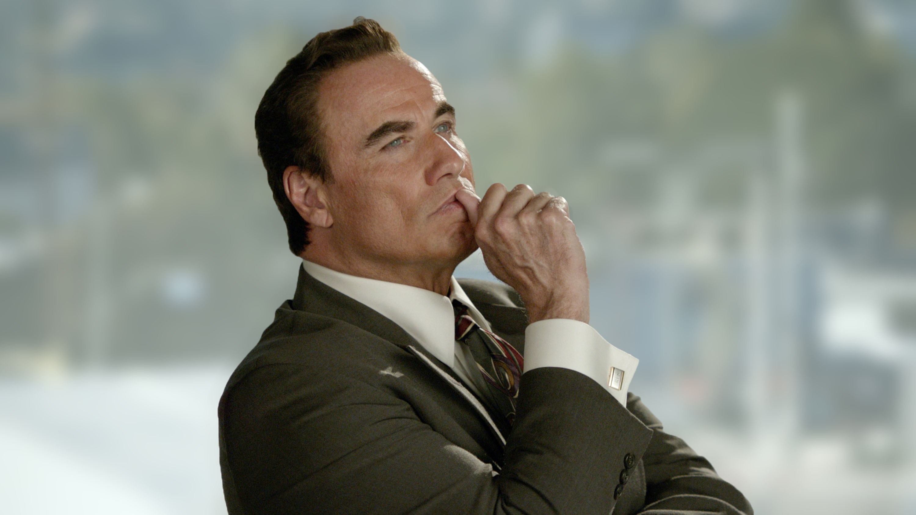It's hard to tell what about how John Travolta looks is more distracting