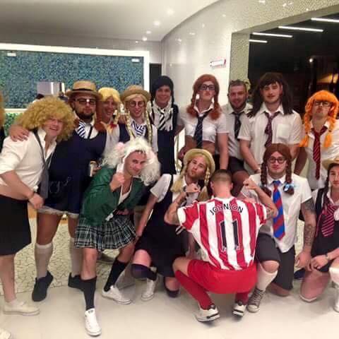 A Magaluf stag do dressed up like Adam Johnson and a group of schoolgirls