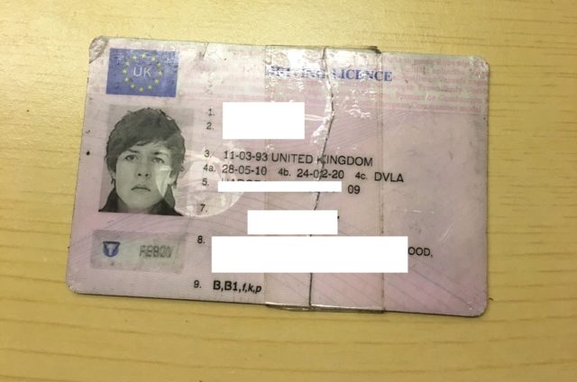 The infamous ID, sellotape and all